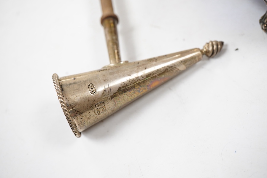 Sundry silver, consisting of - a pair of pepper pots, Birmingham, 1948 a pair of George III pierced oval salts, with blue glass liners and a modern silver candle snuffer with a turned wood handle.